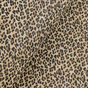 This is a leopard printed pattern on cork fabric