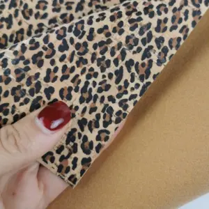 This is a leopard printed pattern on cork fabric