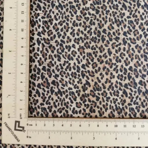 This is a leopard printed pattern on cork fabric