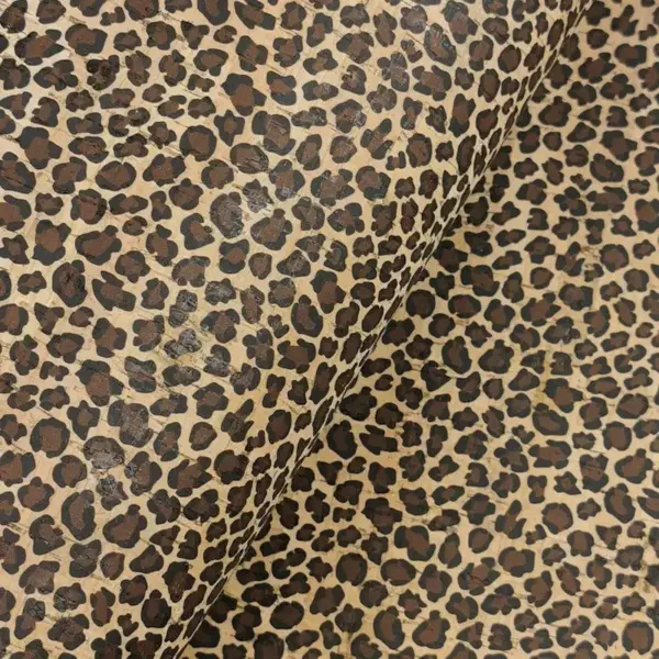 This is a leopard printed pattern on cork fabric