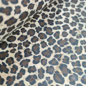 This is a leopard printed pattern on cork fabric