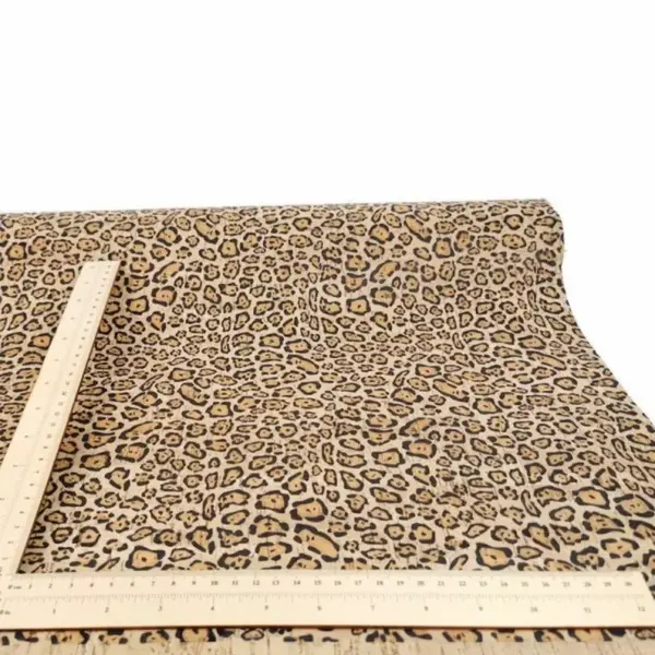 This is a leopard printed pattern on cork fabric