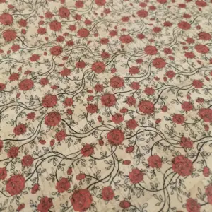 This is a roses printed pattern on cork fabric