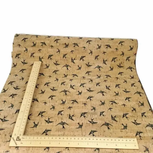 This is a swallows printed pattern on cork fabric