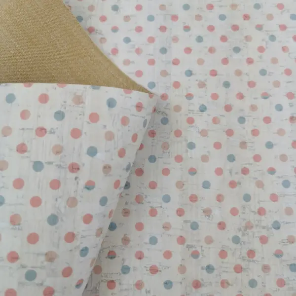 This is a dots printed pattern on cork fabric