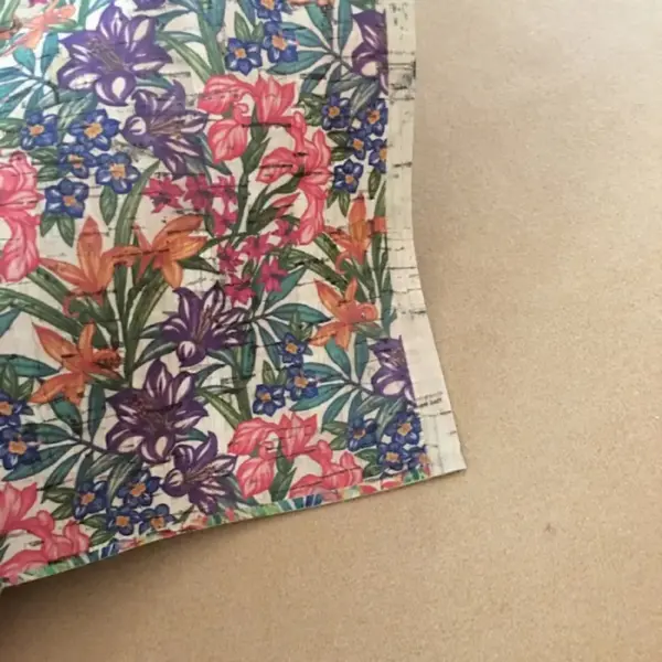 This is a flowers printed pattern on cork fabric