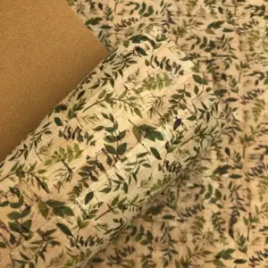 This is a leafs printed pattern on cork fabric