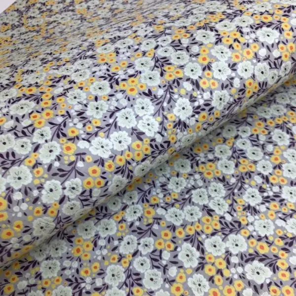 This is a flowers printed pattern on cork fabric