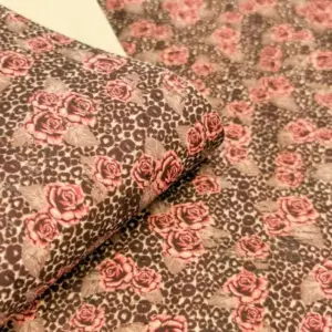 This is a leopard flowers printed pattern on cork fabric