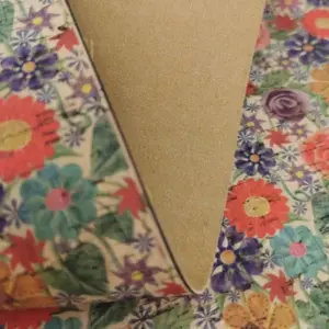 This is a flowers printed pattern on cork fabric