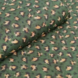 This is a leopard printed pattern on cork fabric