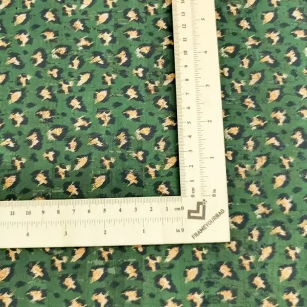 This is a leopard printed pattern on cork fabric