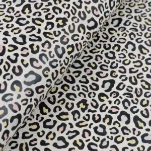 This is a leopard printed pattern on cork fabric