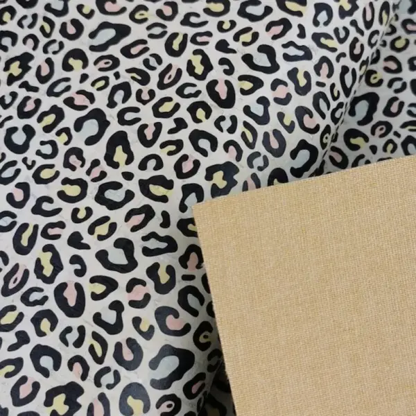 This is a leopard printed pattern on cork fabric