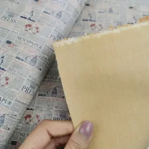 This is a newspaper printed pattern on cork fabric