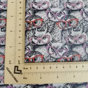 This is a owl printed pattern on cork fabric