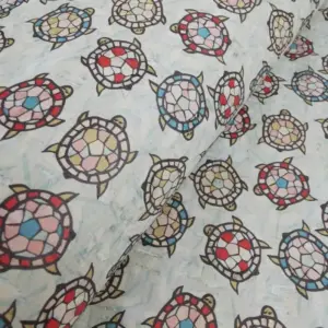 This is a turtles printed pattern on cork fabric