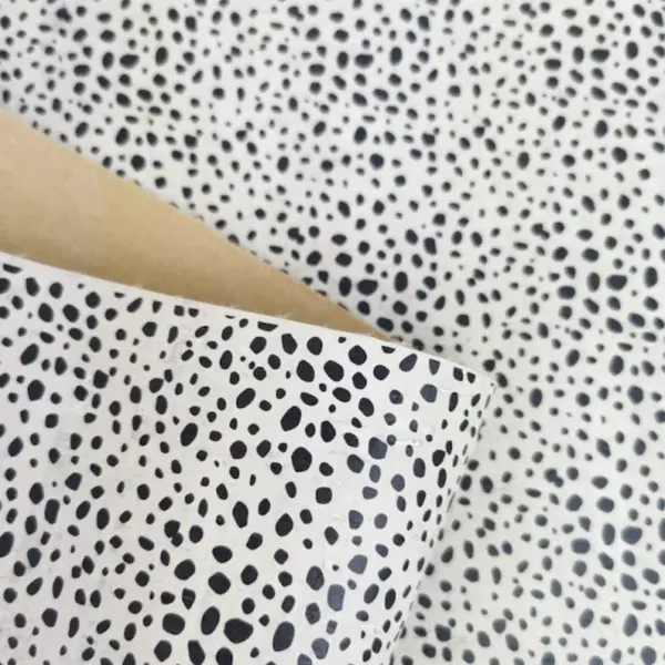 This is a dalmatian printed pattern on cork fabric