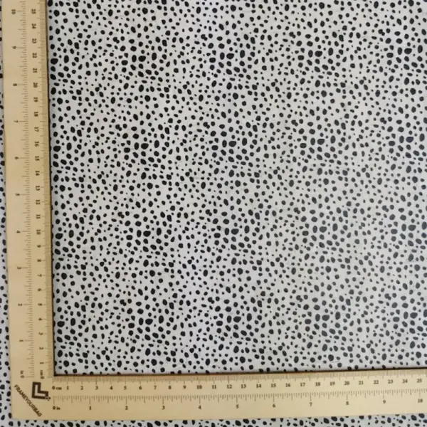 This is a dalmatian printed pattern on cork fabric