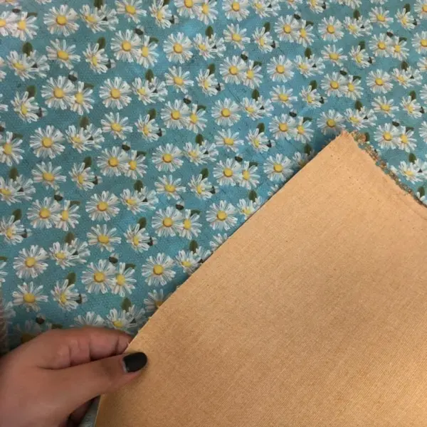 This is a flowers printed pattern on cork fabric