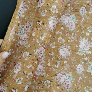 This is a roses printed pattern on cork fabric