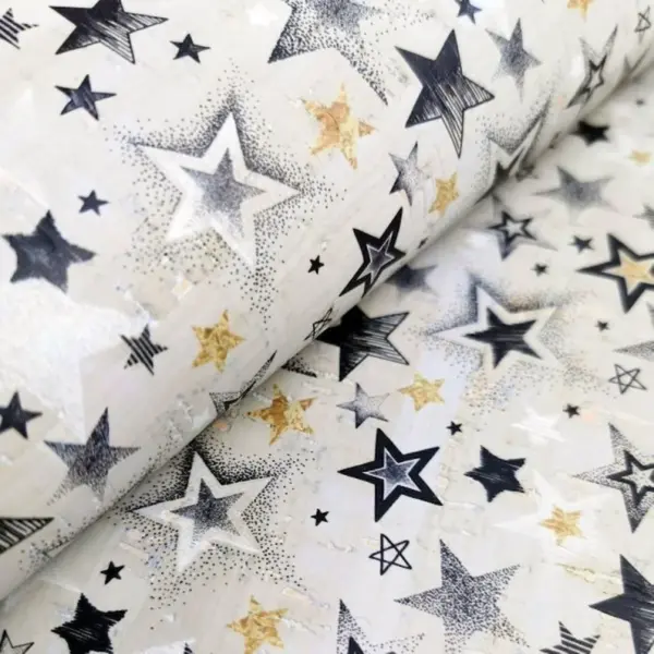 This is a stars printed pattern on cork fabric