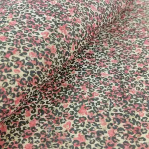 This is a leopard printed pattern on cork fabric