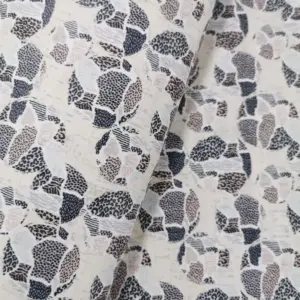 This is a leopard printed pattern on cork fabric