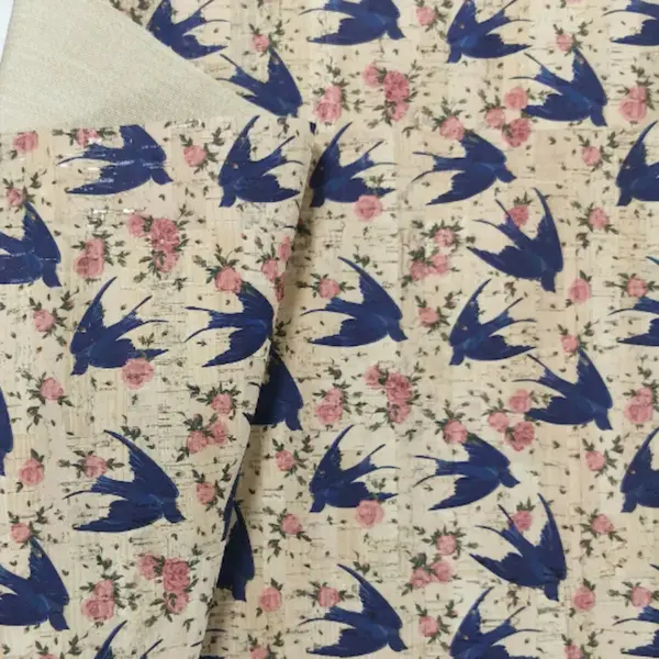 This is a birds printed pattern on cork fabric