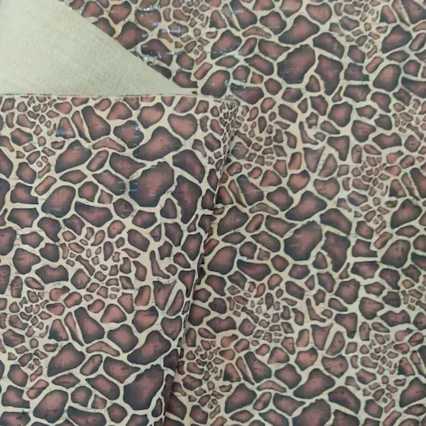 This is a giraffe printed pattern on cork fabric