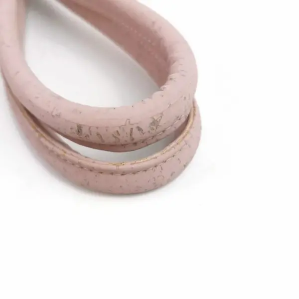 This is a 55cm light pink cork handbag handle