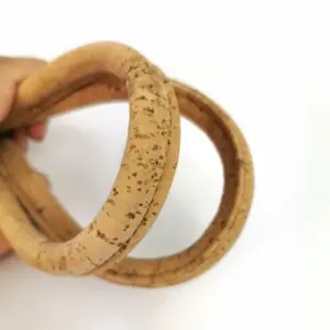 This is a 55cm natural cork handbag handle